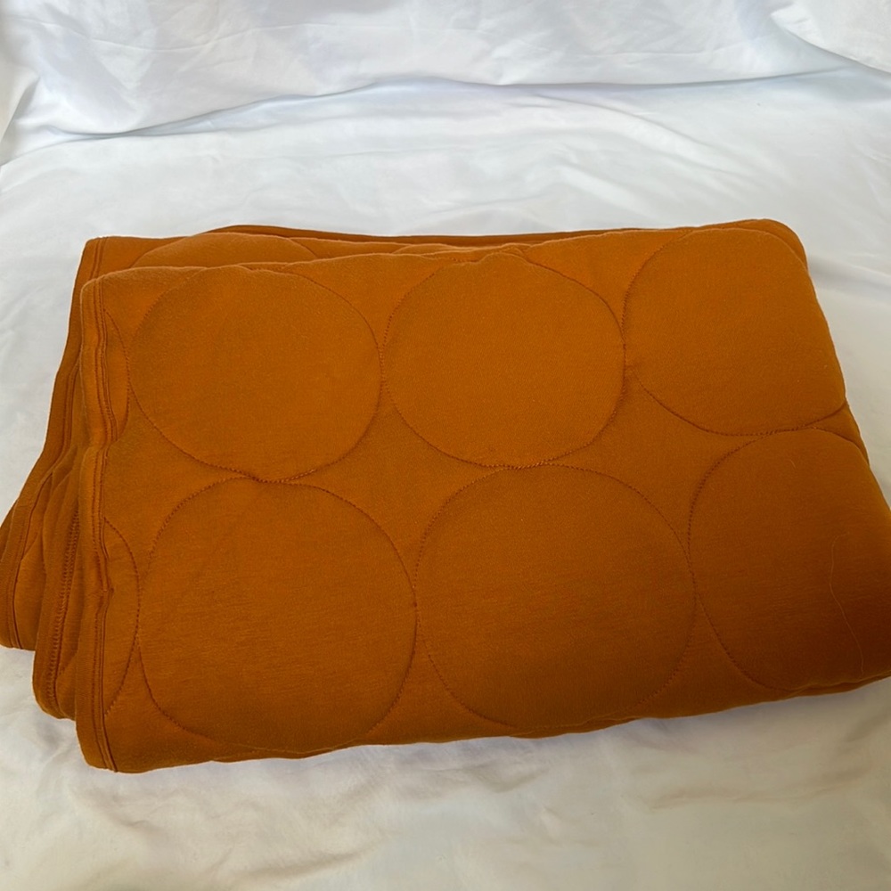 Kate Quinn Orange Modal Quilt